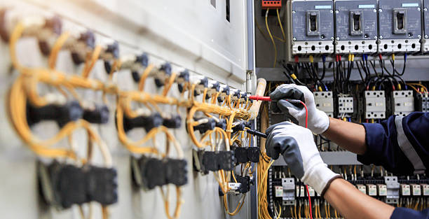 Professional Electrician technician working in Medina, WA